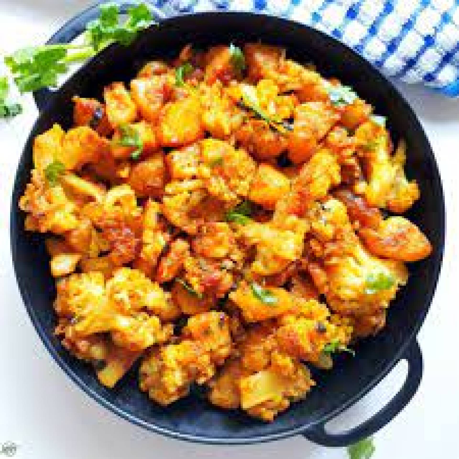 Curry Chicken Aloo Gobi Cauliflower & Scallion Rice.